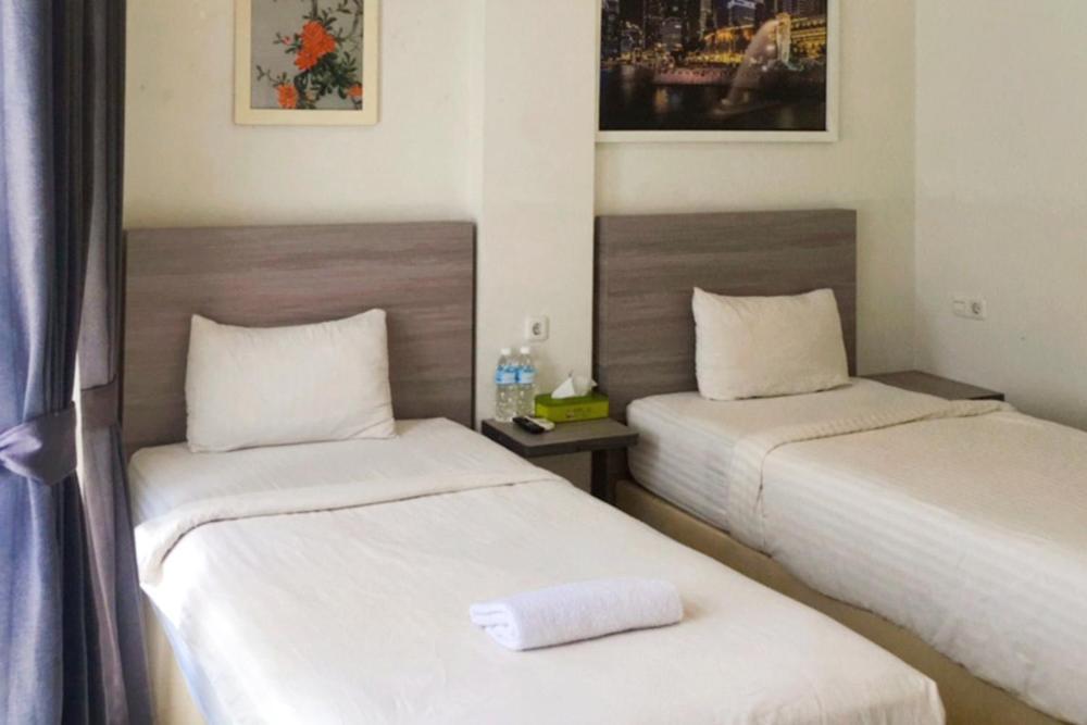 Twospaces Living At Maximus Inn パレンバン エクステリア 写真