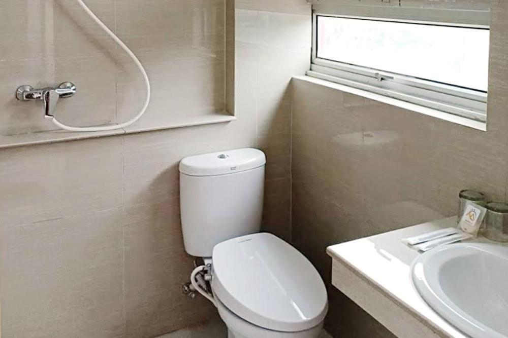 Twospaces Living At Maximus Inn パレンバン エクステリア 写真